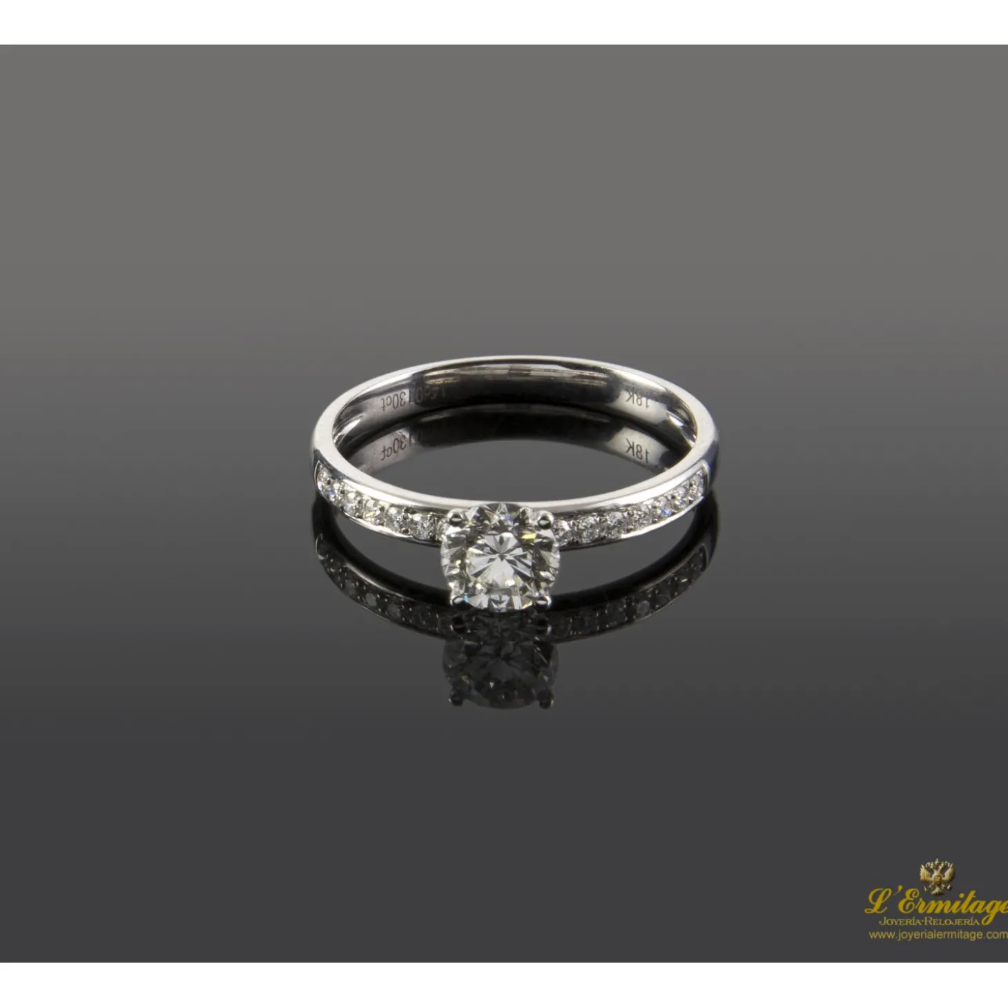 ANILLOS DE COMPROMISO Sortija solitario oro blanco color h, pureza vs1 y peso 0,62 cts.