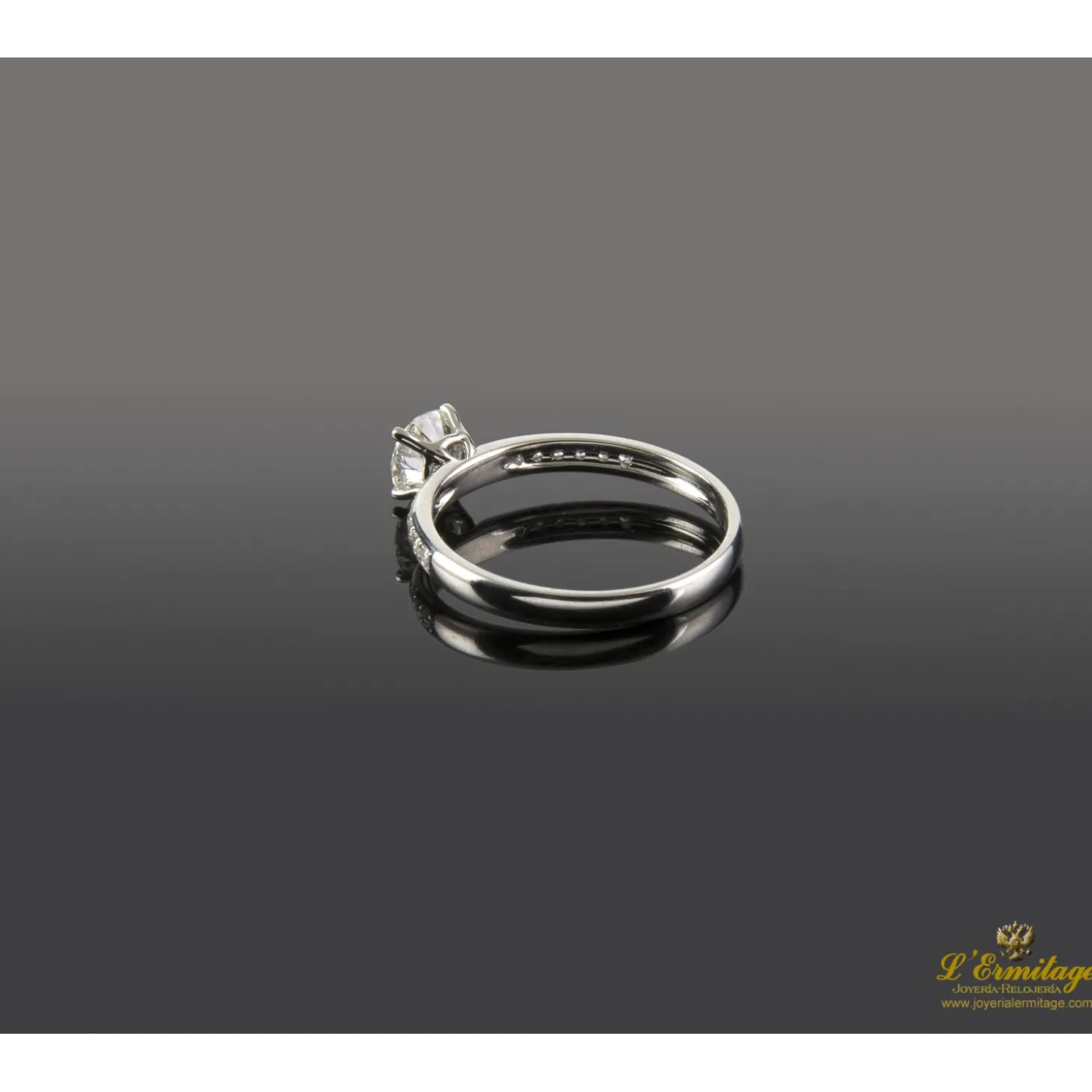 ANILLOS DE COMPROMISO Sortija solitario oro blanco color h, pureza vs1 y peso 0,62 cts.