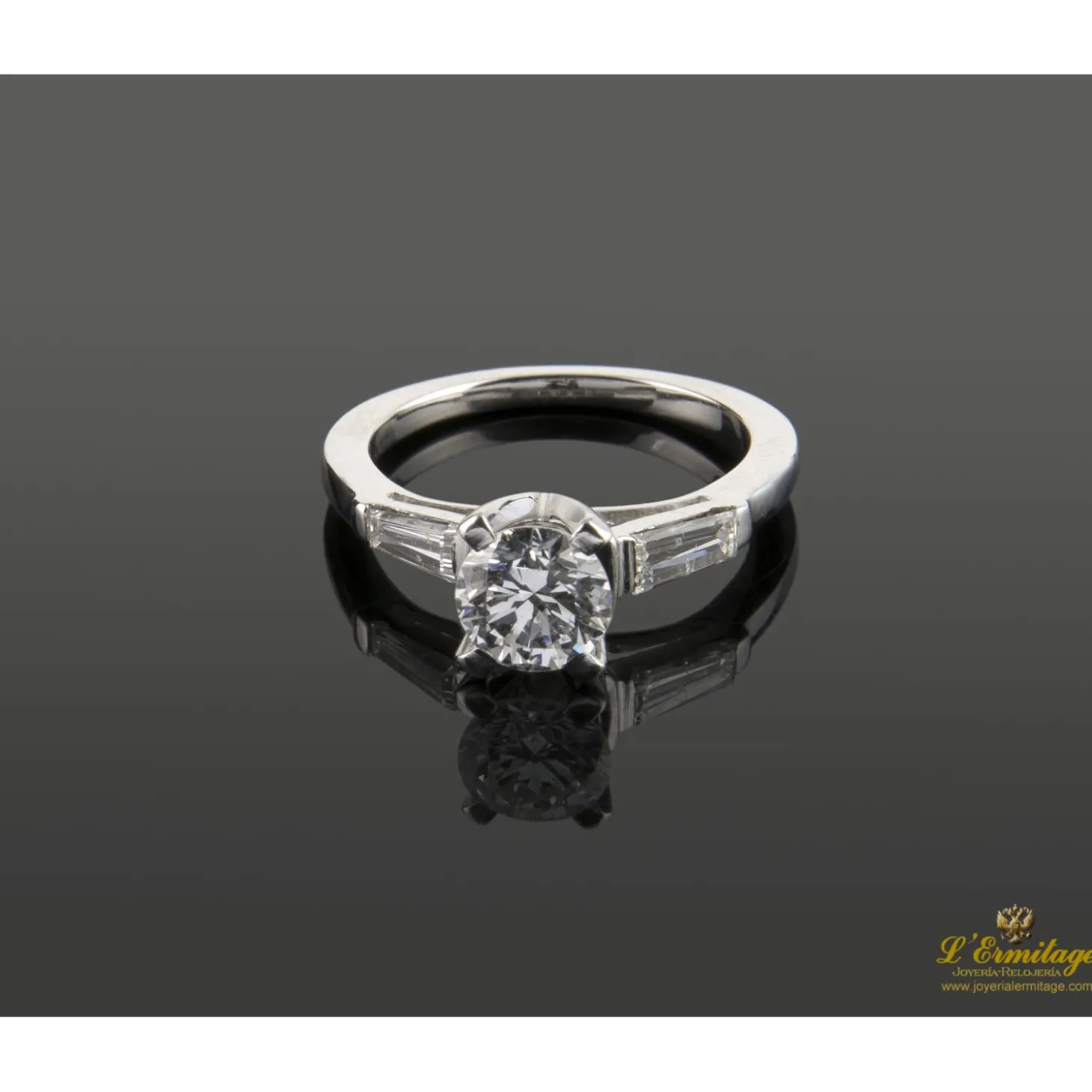 ANILLOS DE COMPROMISO Sortija solitario oro blanco y diamantes color f, pureza si2 y peso 0,95 cts.
