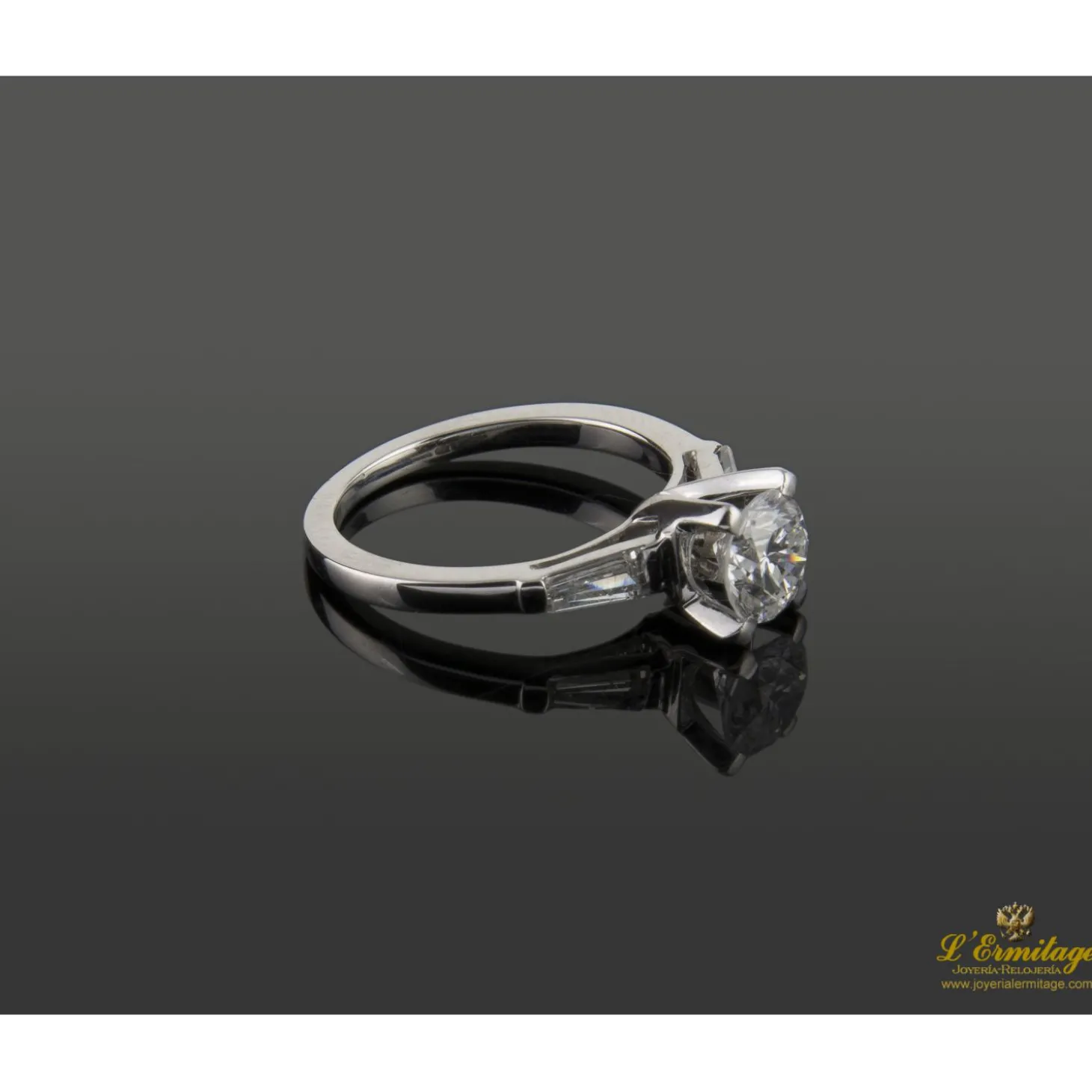 ANILLOS DE COMPROMISO Sortija solitario oro blanco y diamantes color f, pureza si2 y peso 0,95 cts.