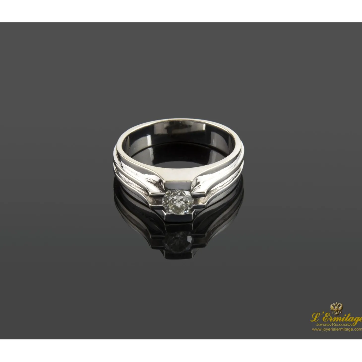 ANILLOS / SORTIJAS Solitario de caballero en oro blanco con un brillante