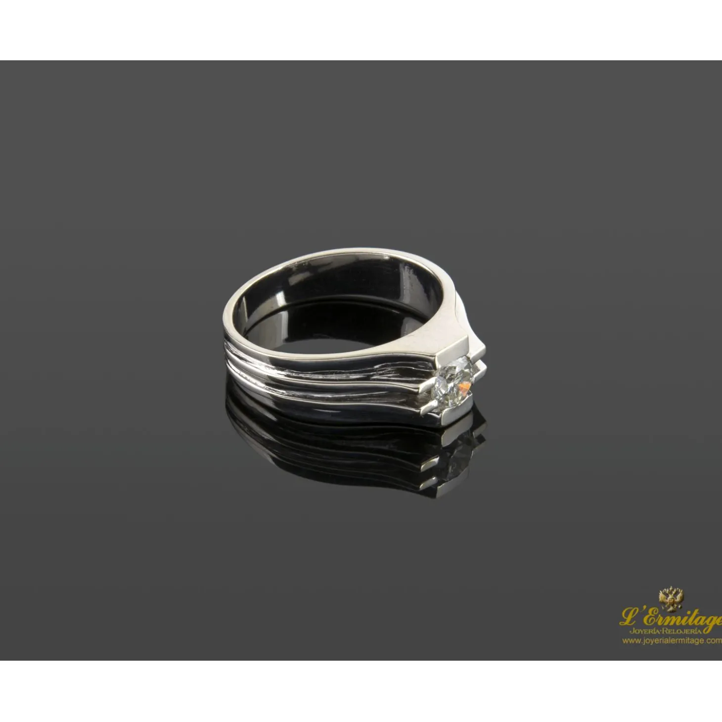 ANILLOS / SORTIJAS Solitario de caballero en oro blanco con un brillante