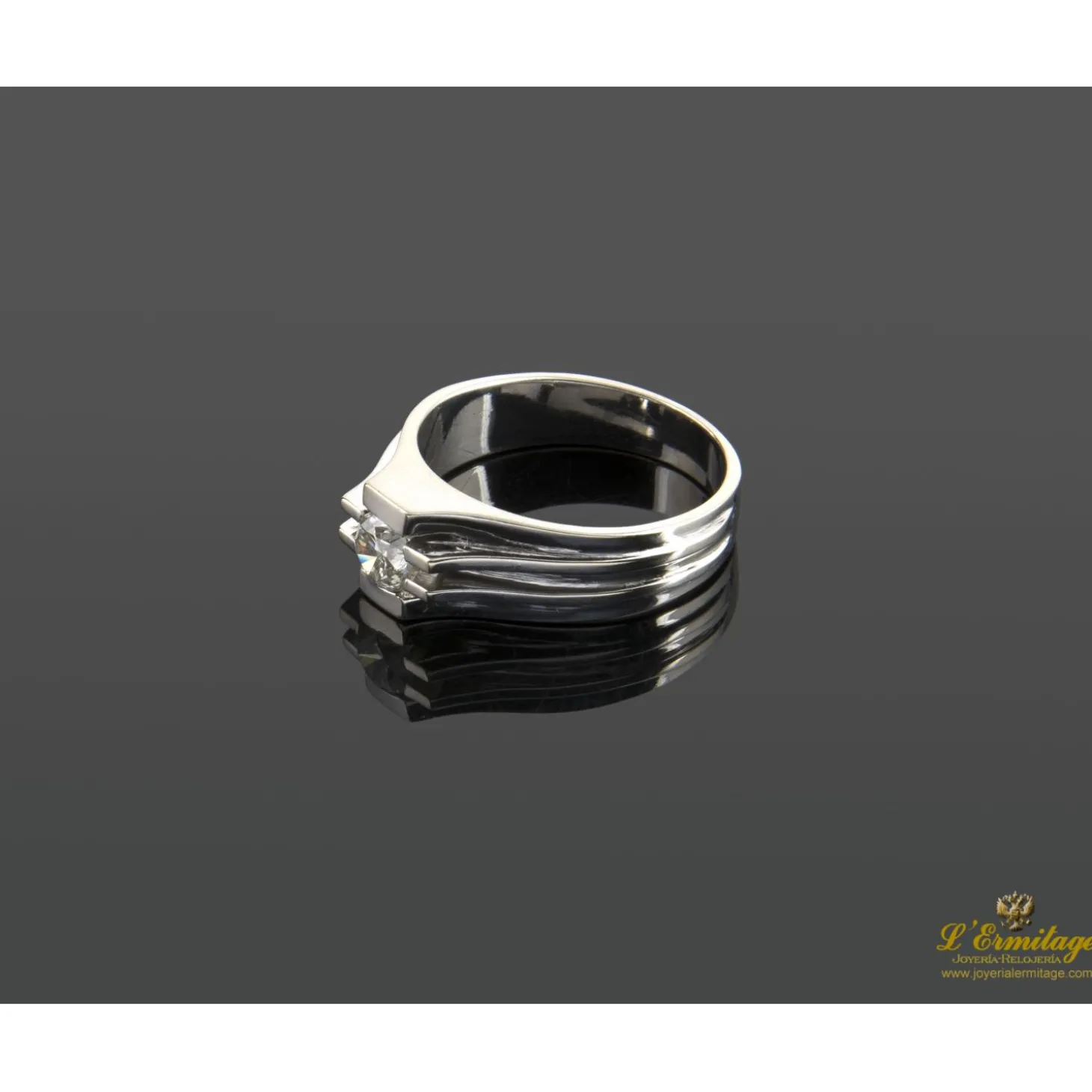 ANILLOS / SORTIJAS Solitario de caballero en oro blanco con un brillante