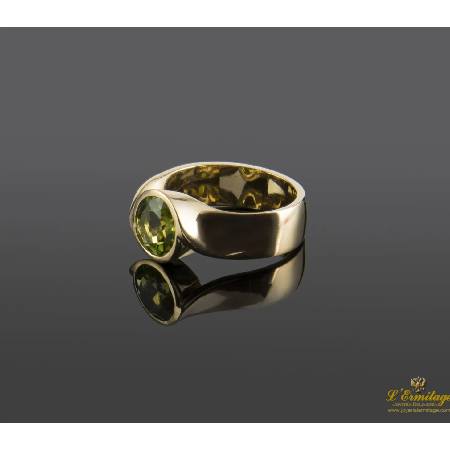 ANILLOS / SORTIJAS Solitario en oro amarillo con olivino talla brillante