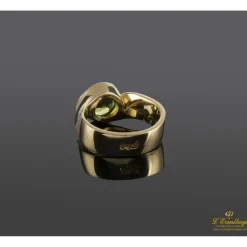 ANILLOS / SORTIJAS Solitario en oro amarillo con olivino talla brillante