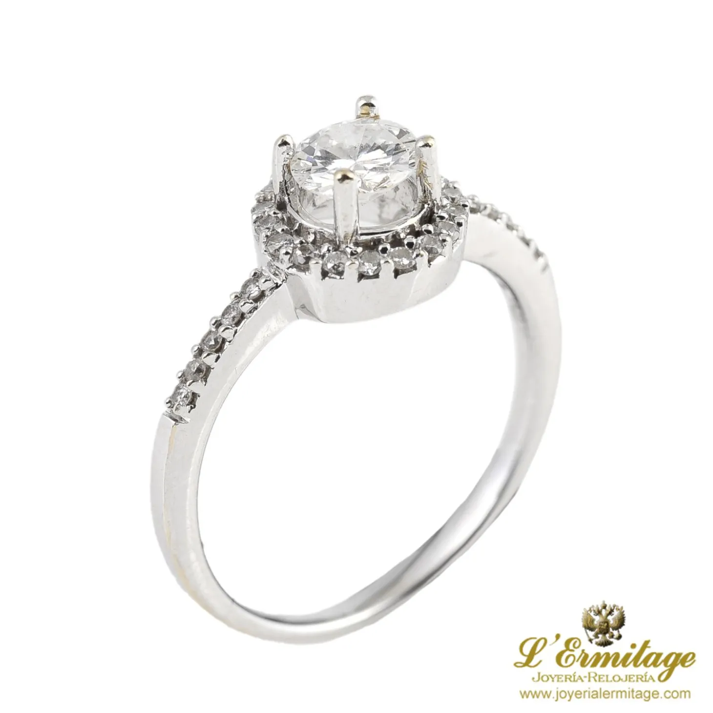 ANILLOS / SORTIJAS Solitario en oro blanco con brillante color f, pureza si 1 y peso 0,55 ct.