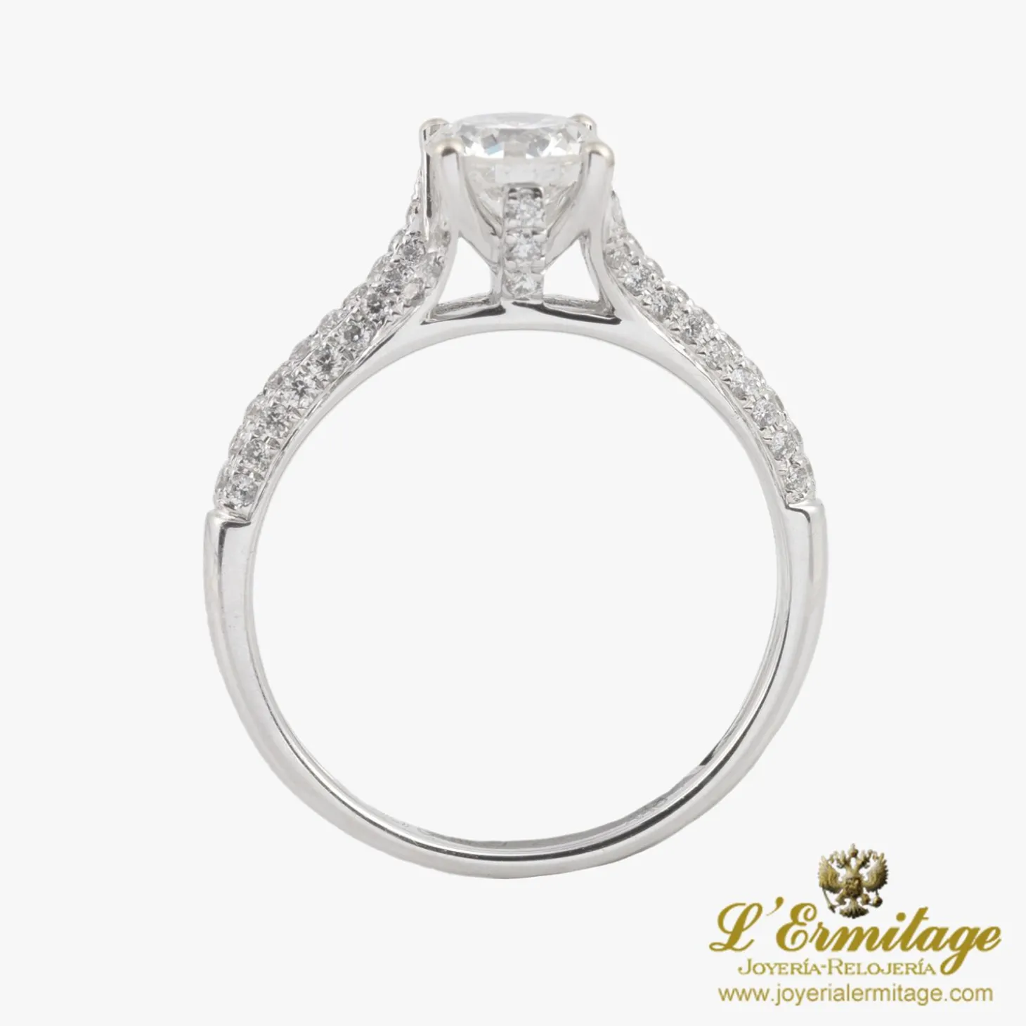 ANILLOS / SORTIJAS Solitario en oro blanco con brillante color g, pureza vs1, y peso 0,75 ct
