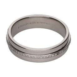 ANILLOS / SORTIJAS Sortija alianza t de tiffany & co. En oro blanco con brillantes. Talla 17.