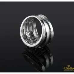 ANILLOS / SORTIJAS Sortija ancha oro blanco y diamantes.