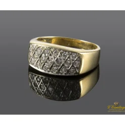 ANILLOS / SORTIJAS Sortija arlequinada realizada en oro amarillo y oro blanco con zirconitas.