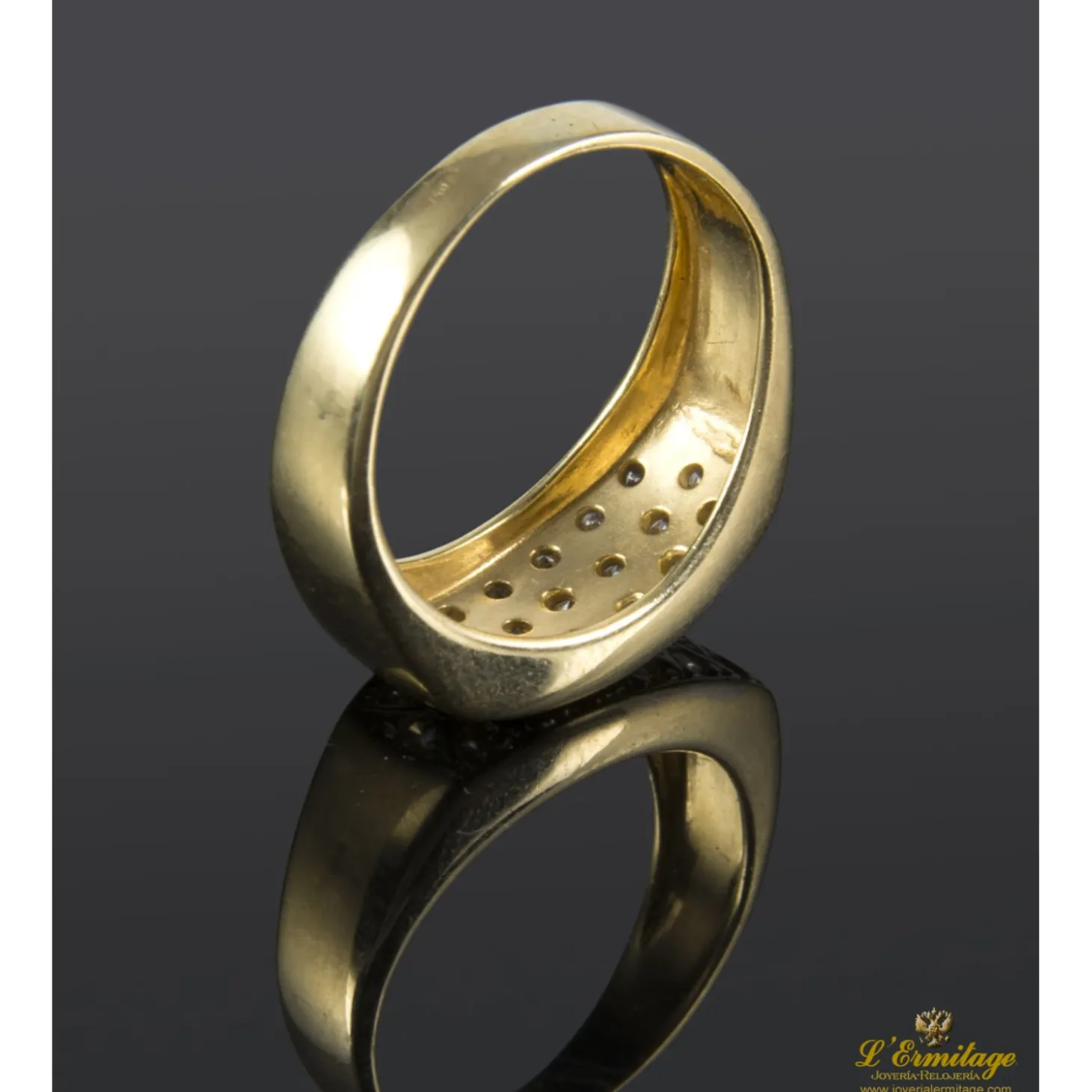 ANILLOS / SORTIJAS Sortija arlequinada realizada en oro amarillo y oro blanco con zirconitas.