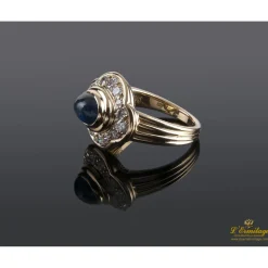 ANILLOS / SORTIJAS Sortija cartier antigua oro amarillo zafiro cabuchón y diamantes.