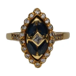 ANILLOS / SORTIJAS Sortija en oro amarillo con zafiros y brillantes. Talla 10.