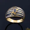 ANILLOS / SORTIJAS Sortija en oro amarillo con zafiros y brillantes.