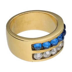 ANILLOS / SORTIJAS Sortija en oro amarillo con zafiros y brillantes. Talla 16.