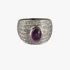 ANILLOS / SORTIJAS Sortija en oro blanco con un rubi central y motivos con brillantes dispuestos en fila