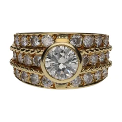 ANILLOS / SORTIJAS Sortija en oro amarillo y brillantes. Talla 12.