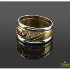 ANILLOS / SORTIJAS Sortija oro amarillo oro blanco rubí cabuchón y diamantes.