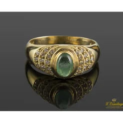 ANILLOS / SORTIJAS Sortija realizada en oro amarillo con una esmeralda y brillantes