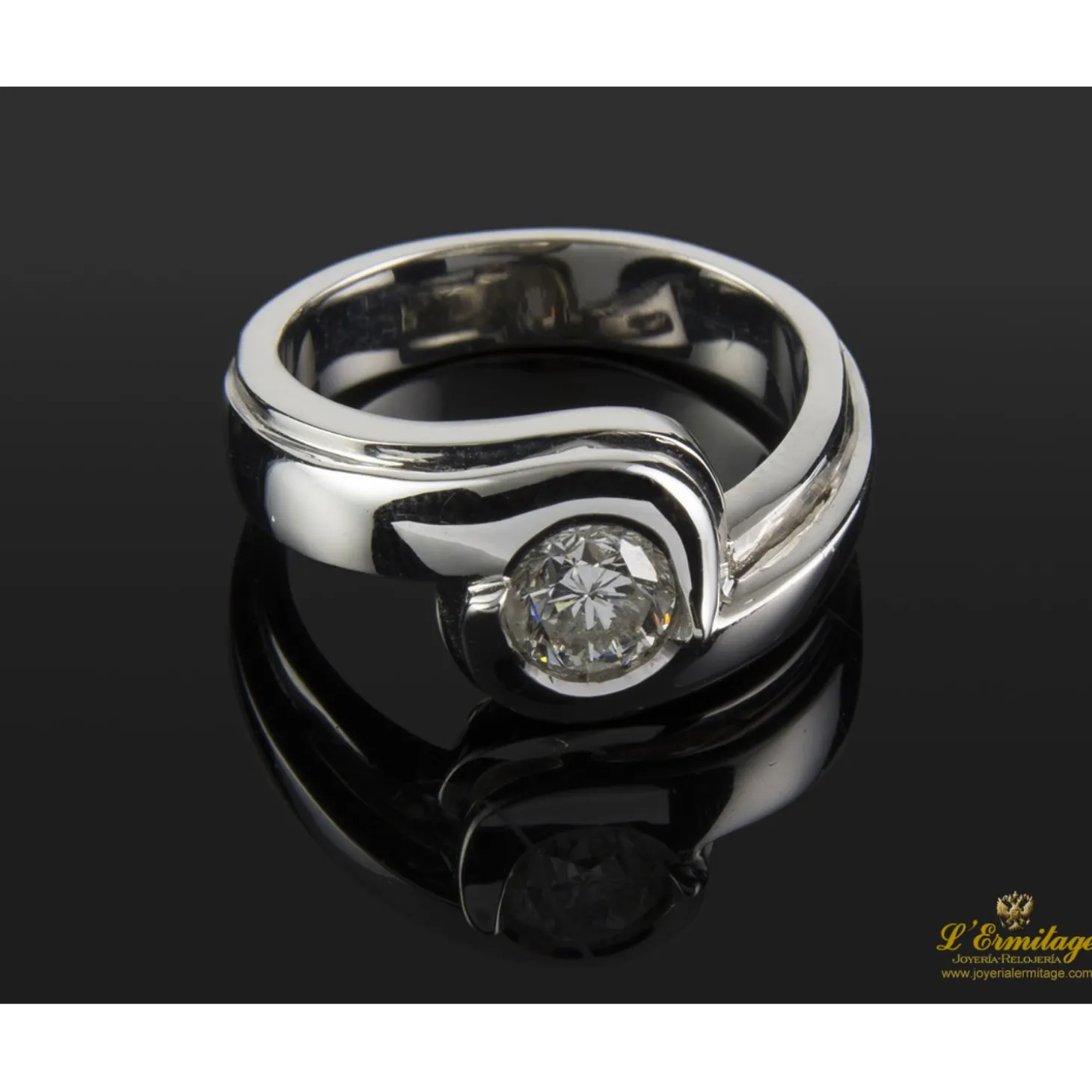 ANILLOS / SORTIJAS Sortija solitario oro blanco color h, pureza si2 y peso 0,64 cts.