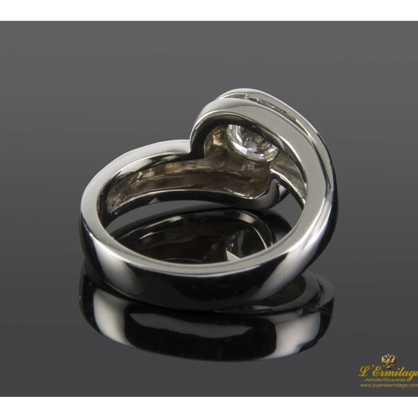 ANILLOS / SORTIJAS Sortija solitario oro blanco color h, pureza si2 y peso 0,64 cts.