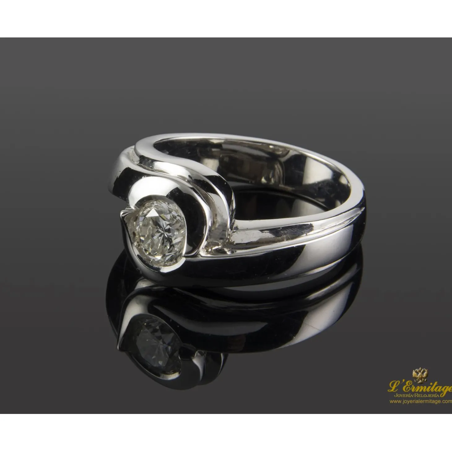 ANILLOS / SORTIJAS Sortija solitario oro blanco color h, pureza si2 y peso 0,64 cts.