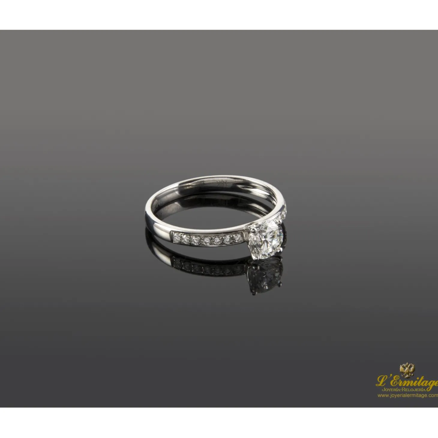 ANILLOS / SORTIJAS Sortija solitario oro blanco color h, pureza vs1 y peso 0,62 cts.