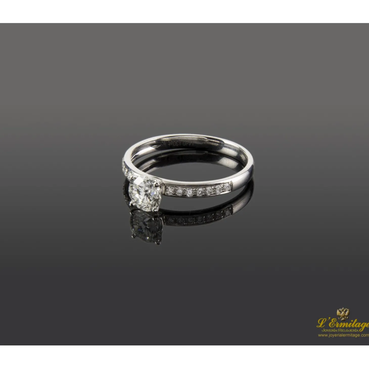 ANILLOS / SORTIJAS Sortija solitario oro blanco color h, pureza vs1 y peso 0,62 cts.