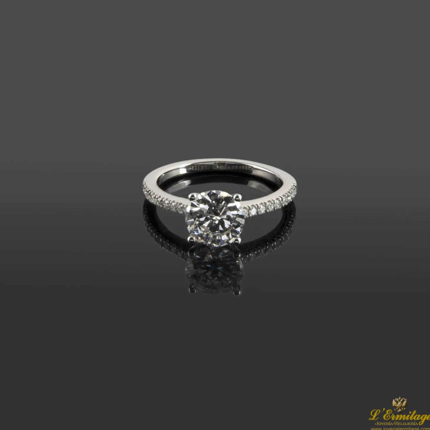 ANILLOS / SORTIJAS Sortija solitario oro blanco color f, pureza vs1 y peso 1,55 cts.