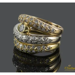 ANILLOS / SORTIJAS Sortija tres aros realizada en oro amarillo, oro blanco y oro rosa. Presenta motivos con brillantes.