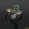 ANILLOS / SORTIJAS Sortija tu y yo realizada en oro amarillo con una esmeralda y un brillante