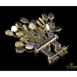 BROCHES / ALFILERES Broche-alfiler oro amarillo, pepitas de oro y diamantes.