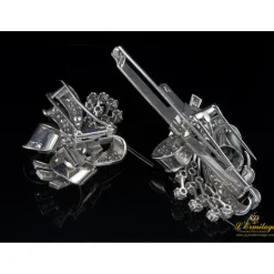 BROCHES / ALFILERES Broche doble clip en oro blanco y brillantes lazos