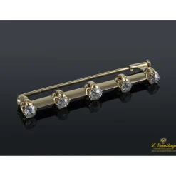 BROCHES / ALFILERES Broche en barra realizado en oro amarillo con brillantes.