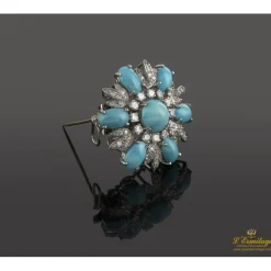 BROCHES / ALFILERES Broche en forma de flor oro blanco turquesas y diamantes.