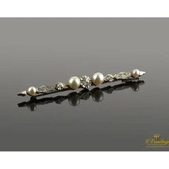 BROCHES / ALFILERES Broche en oro amarillo y oro blano con diamantes y perlas.