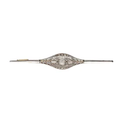 BROCHES / ALFILERES Broche en oro amarillo y oro blanco con diamantes.