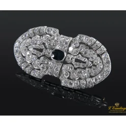 BROCHES / ALFILERES Broche oro blanco y diamantes.