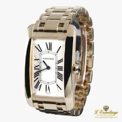 CARTIER Tank americaine oro amarillo cuerda manual caballero