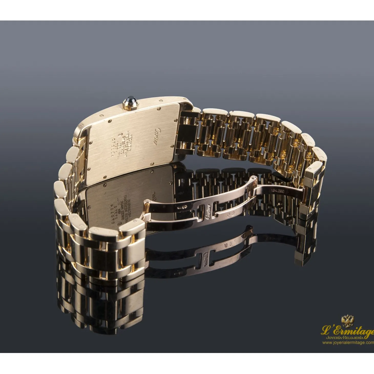 CARTIER Tank americaine oro amarillo cuerda manual caballero