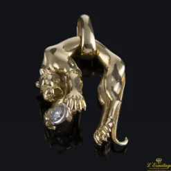 COLGANTES Colgante pantera tipo cartier realizado en oro amarillo y presenta un brillante