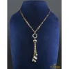 COLLARES Cadena doble de anillas realizada en oro blanco y oro amarillo.