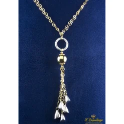 COLLARES Cadena doble de anillas realizada en oro blanco y oro amarillo.