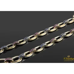 COLLARES Collar en oro amarillo con rubíes y zafiros.