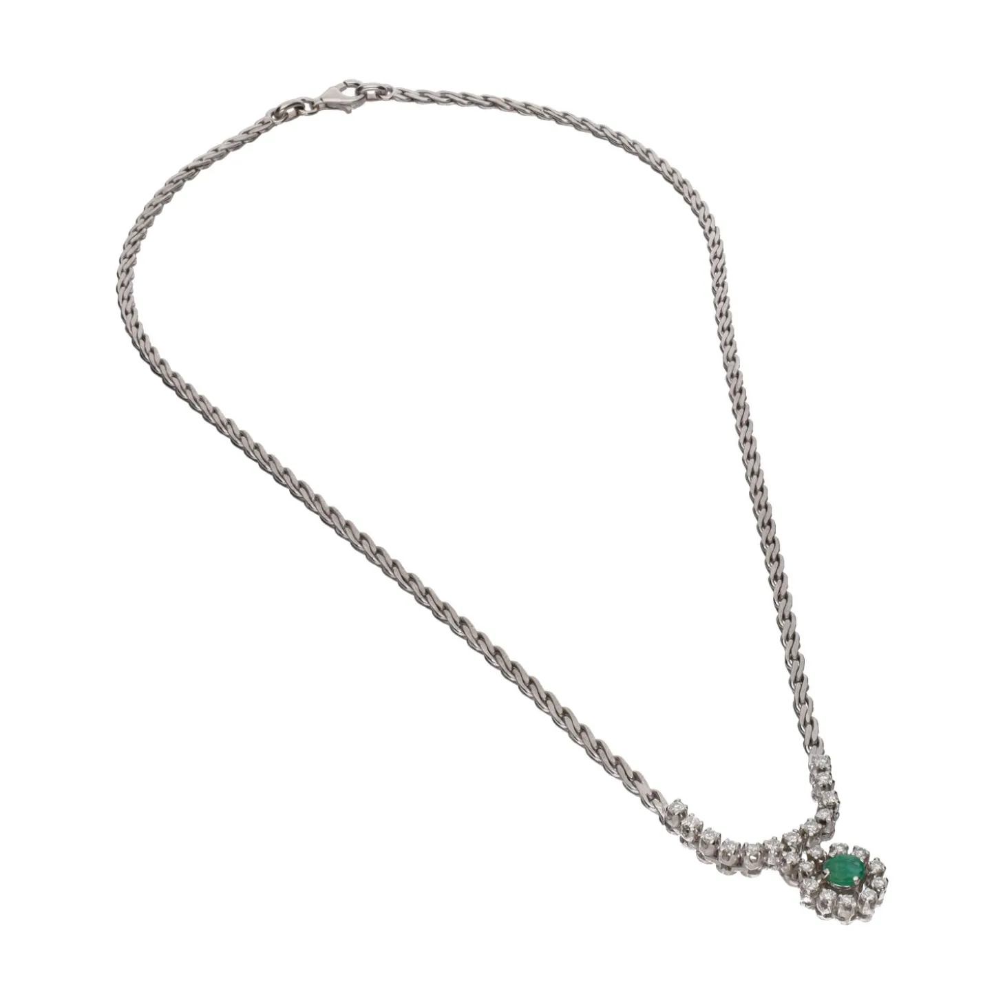 COLLARES Collar en oro blanco con esmeralda y brillantes.