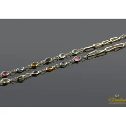 COLLARES Collar oro amarillo con piedras de color.