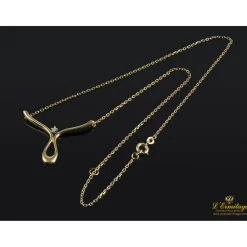 COLLARES Collar realizado en oro amarillo con un brillante.