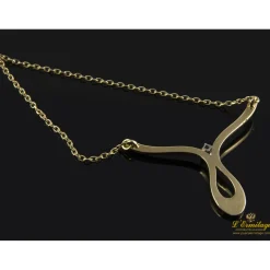 COLLARES Collar realizado en oro amarillo con un brillante.