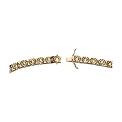 COLLARES Collar realizado en oro amarillo y oro blanco.