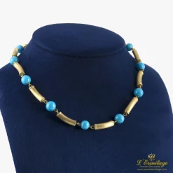 COLLARES Gargantilla oro amarillo mate y turquesas. 40 Cm largo.